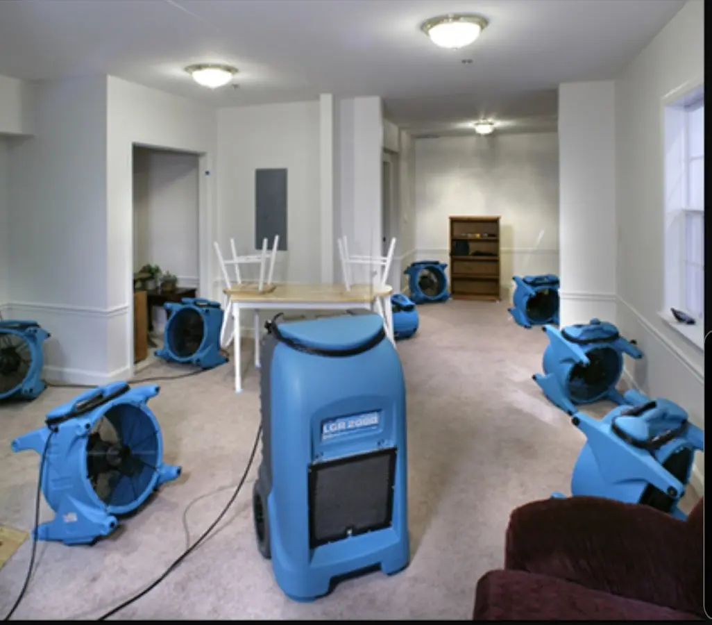 Air movers and dehumidifier setup for Water Extraction & Removal in Cuero